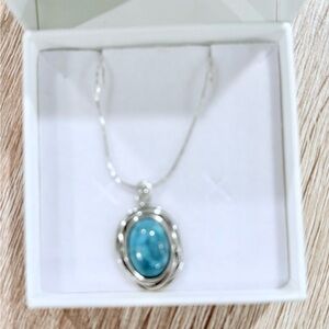 Blue and Silver Pendant Necklace with Elegant Design